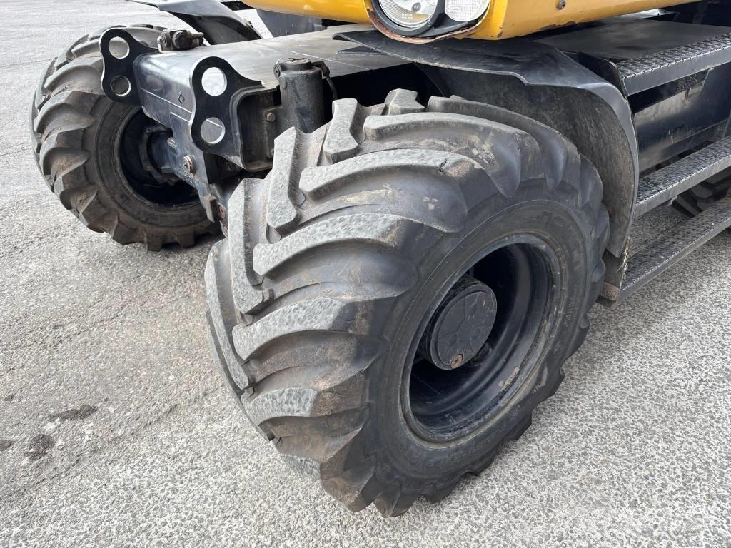CAT M 313 D Escavatori gommati