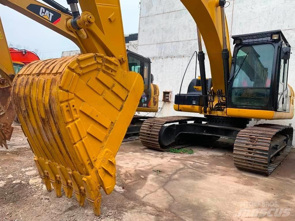 CAT 323 D L Escavatori cingolati