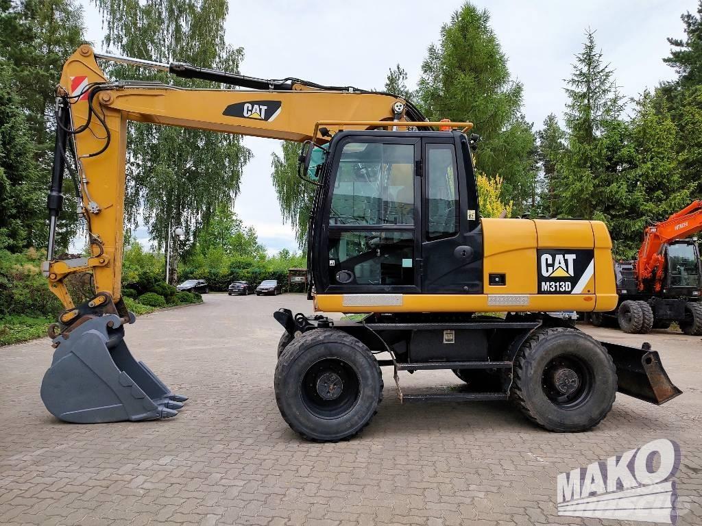 CAT M 313 D Escavatori gommati
