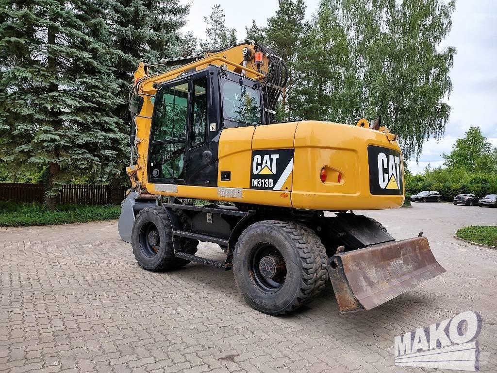 CAT M 313 D Escavatori gommati