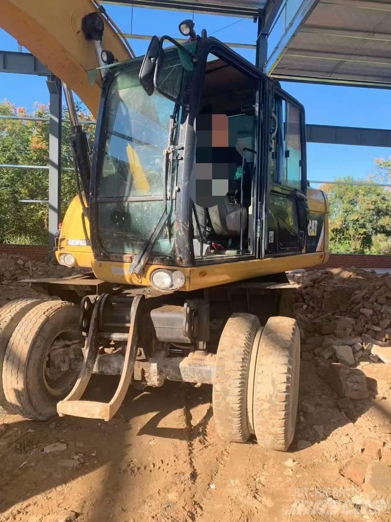 CAT 315 D Escavatori gommati