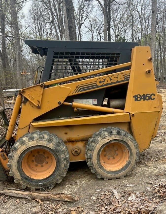 CASE 1845 C Mini Pale Gommate