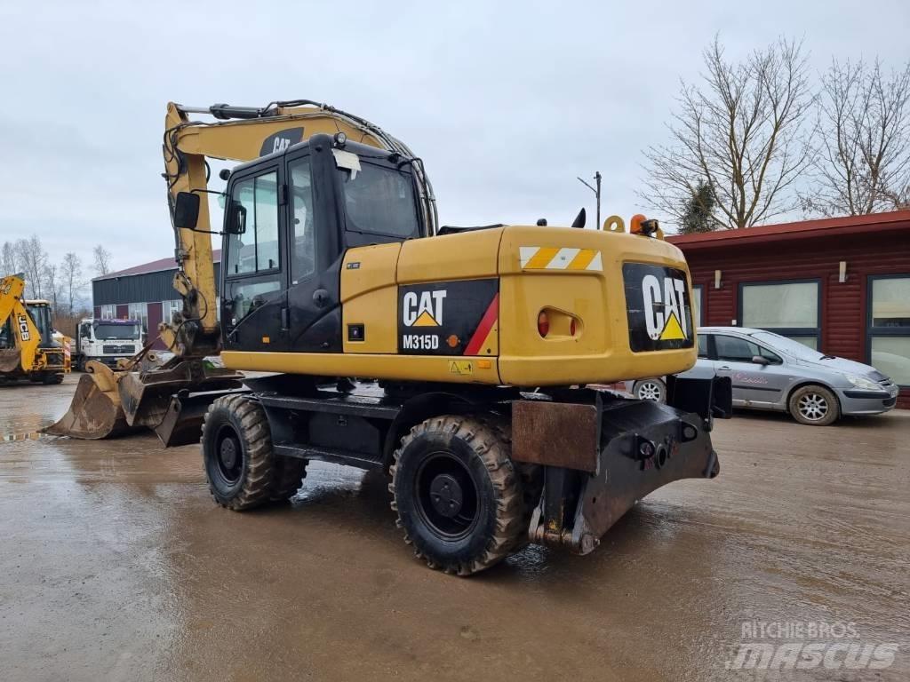 CAT M 315 D II Escavatori gommati