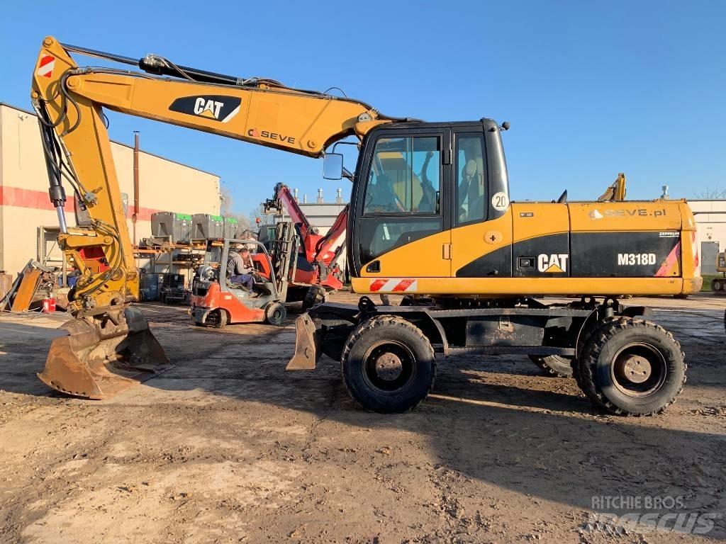 CAT M 318 D Escavatori gommati