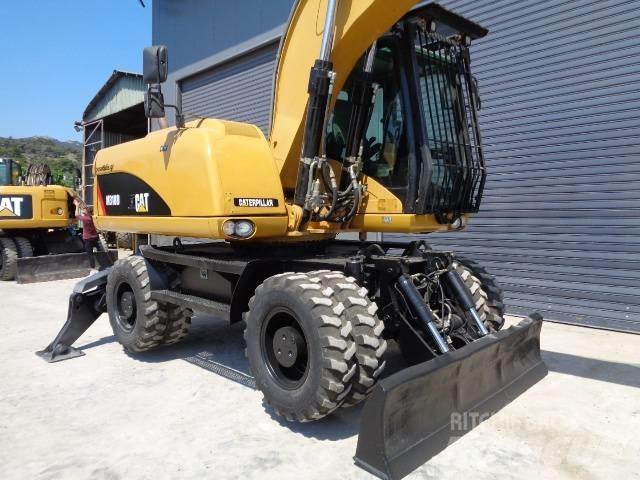 CAT M 318 D Escavatori gommati