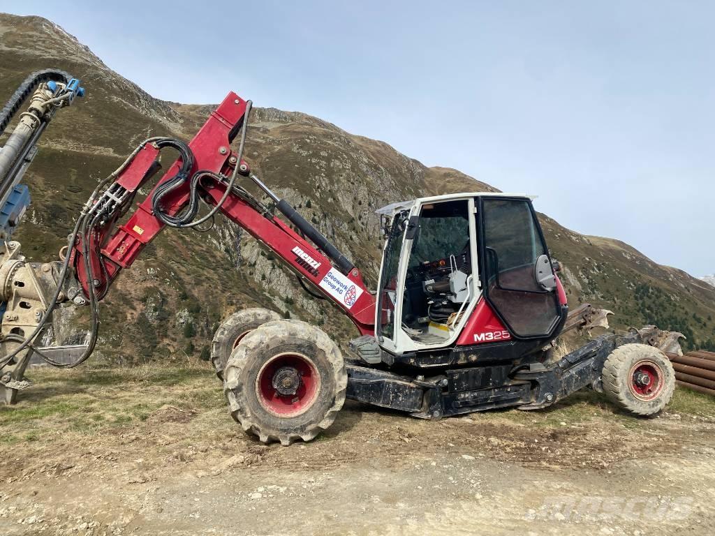Menzi Muck 325 Escavatori gommati
