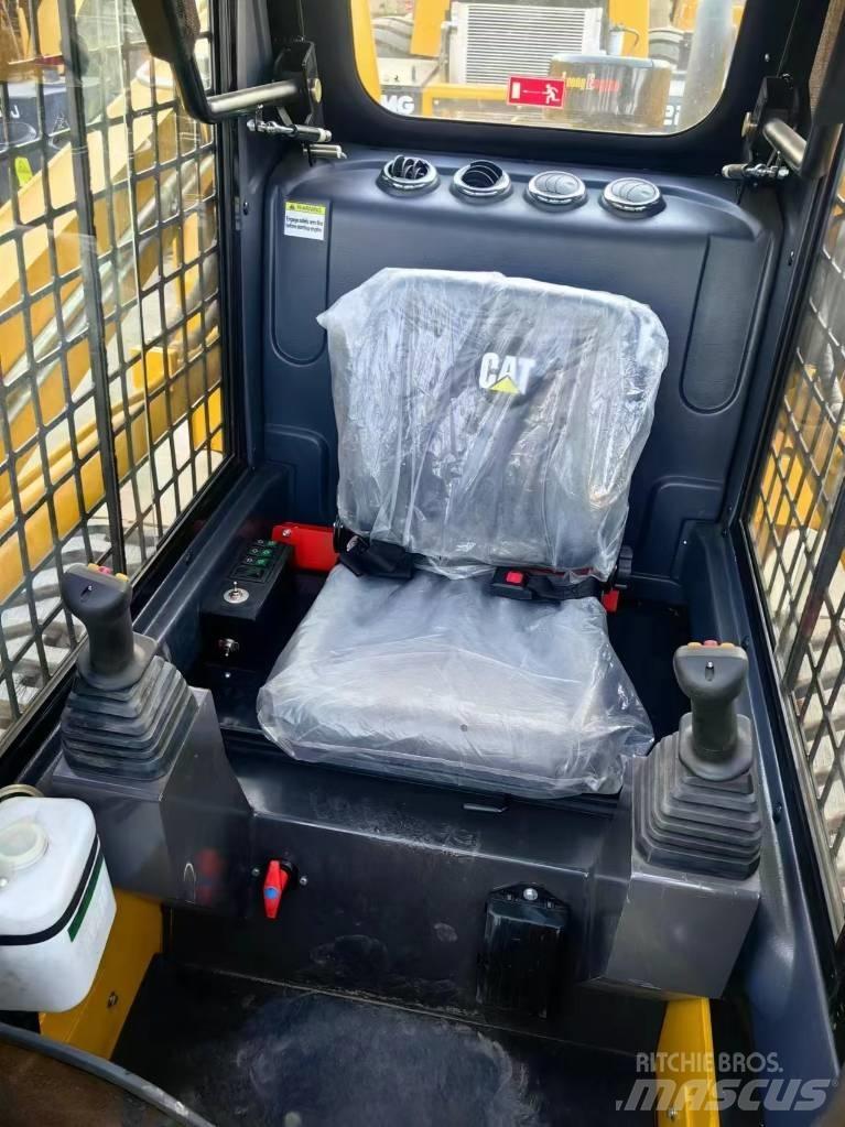 CAT 277 D Mini Pale Gommate