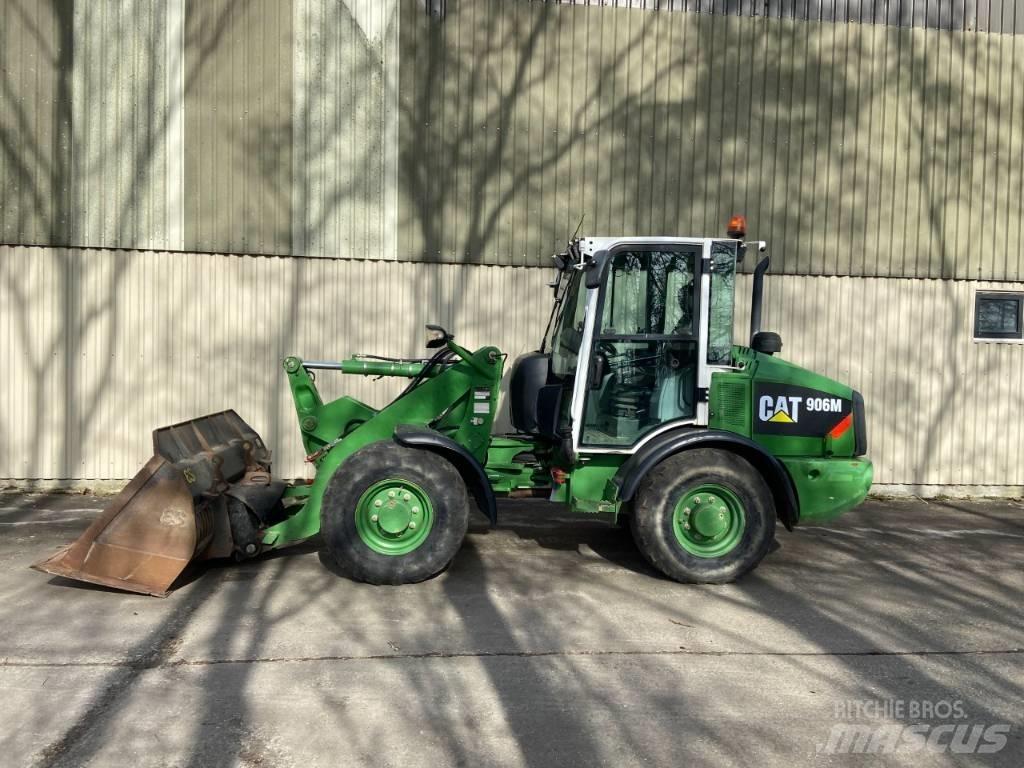 CAT 906M Pale gommate