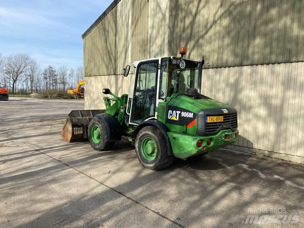 CAT 906M Pale gommate