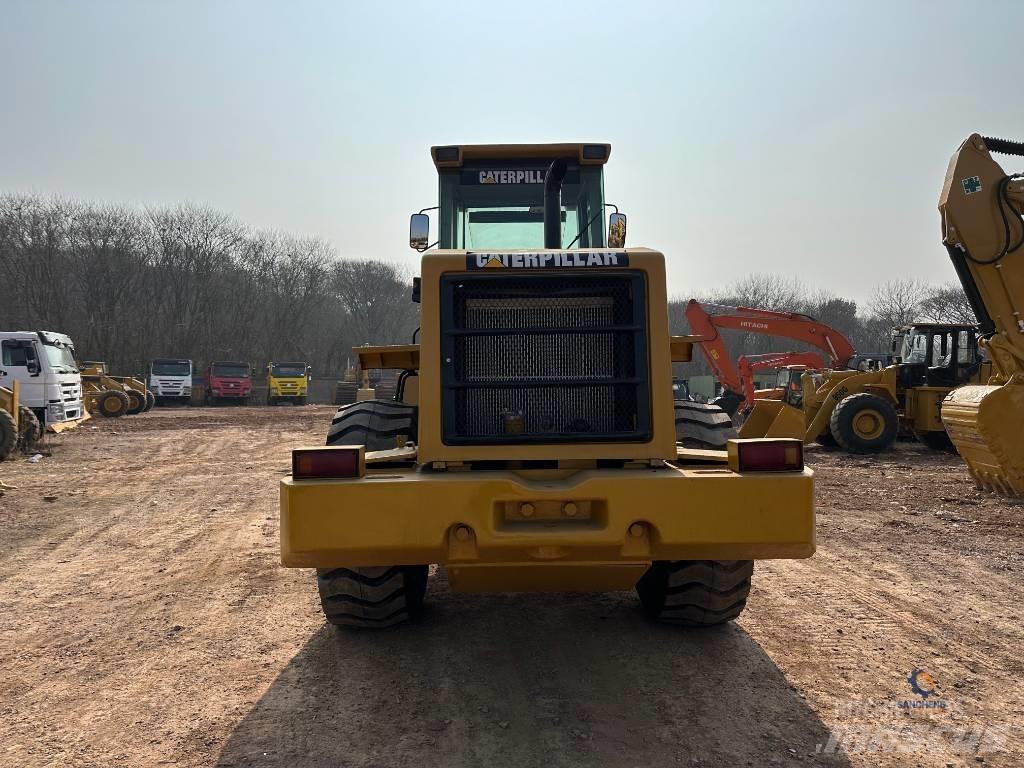 CAT 950G Pale gommate