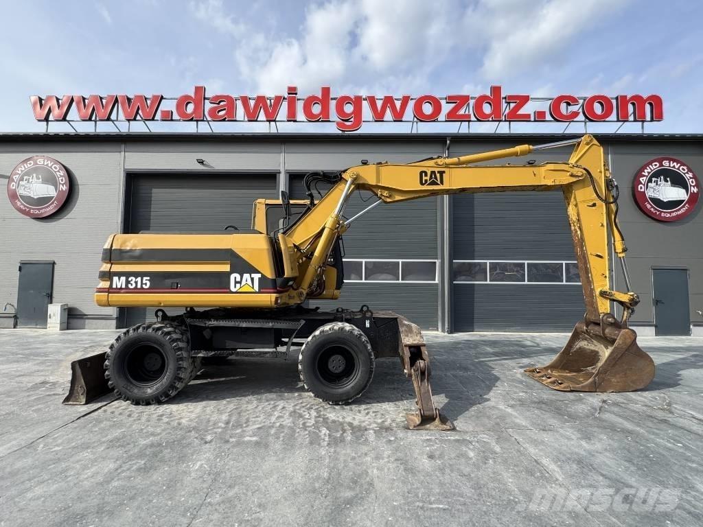 CAT M 315 Escavatori gommati