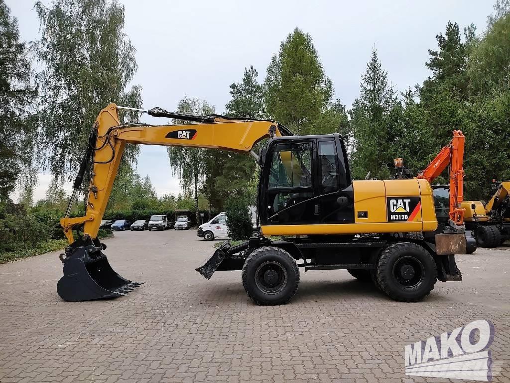 CAT M 313 D Escavatori gommati
