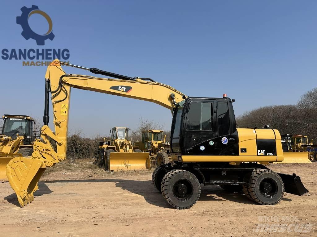 CAT M 320 D2 Escavatori gommati
