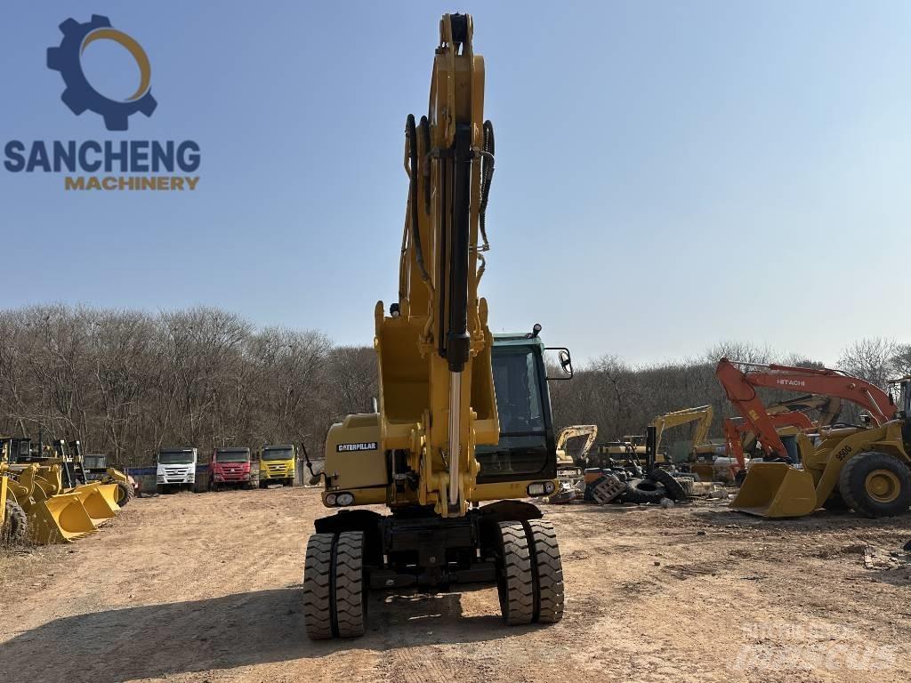 CAT M 320 D2 Escavatori gommati