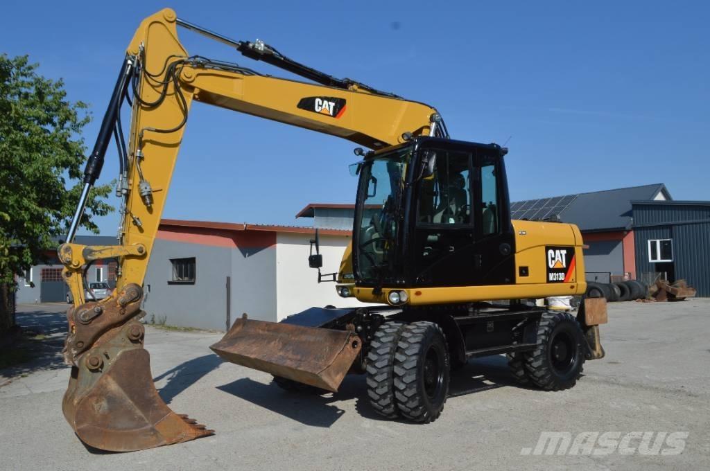 CAT M 313 D Escavatori gommati