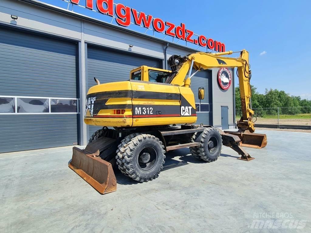 CAT M 312 Escavatori gommati