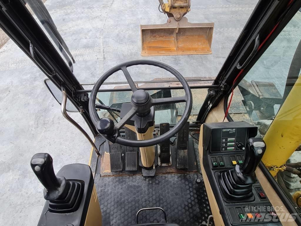 CAT M 312 Escavatori gommati