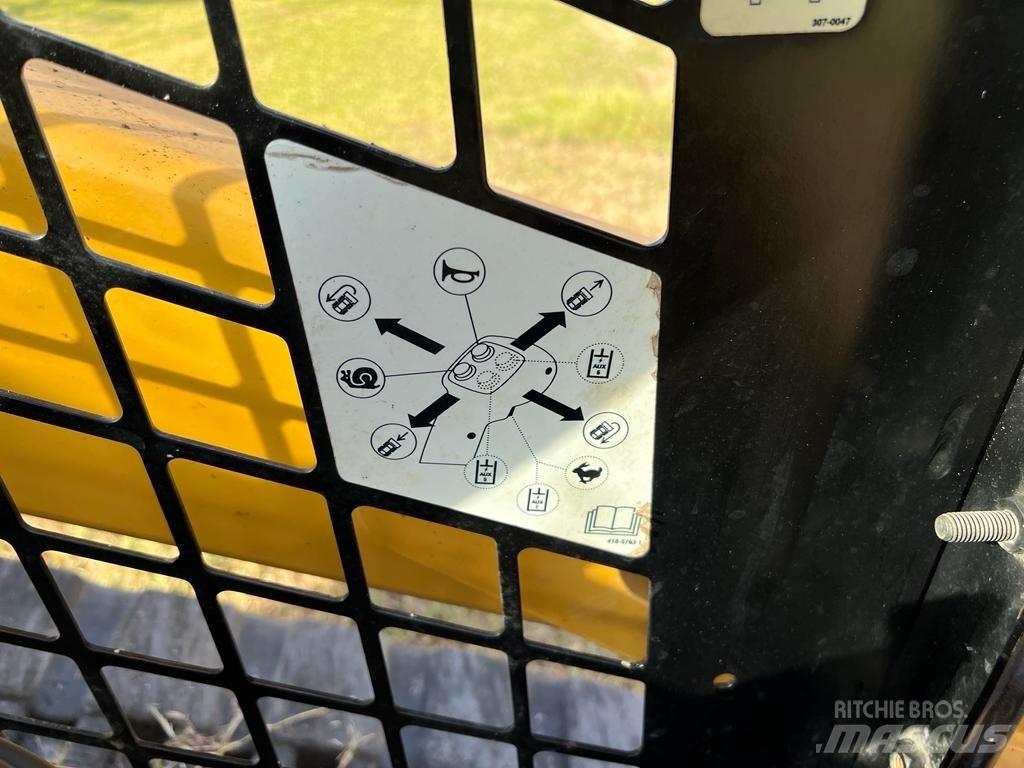 CAT 259 D Mini Pale Gommate