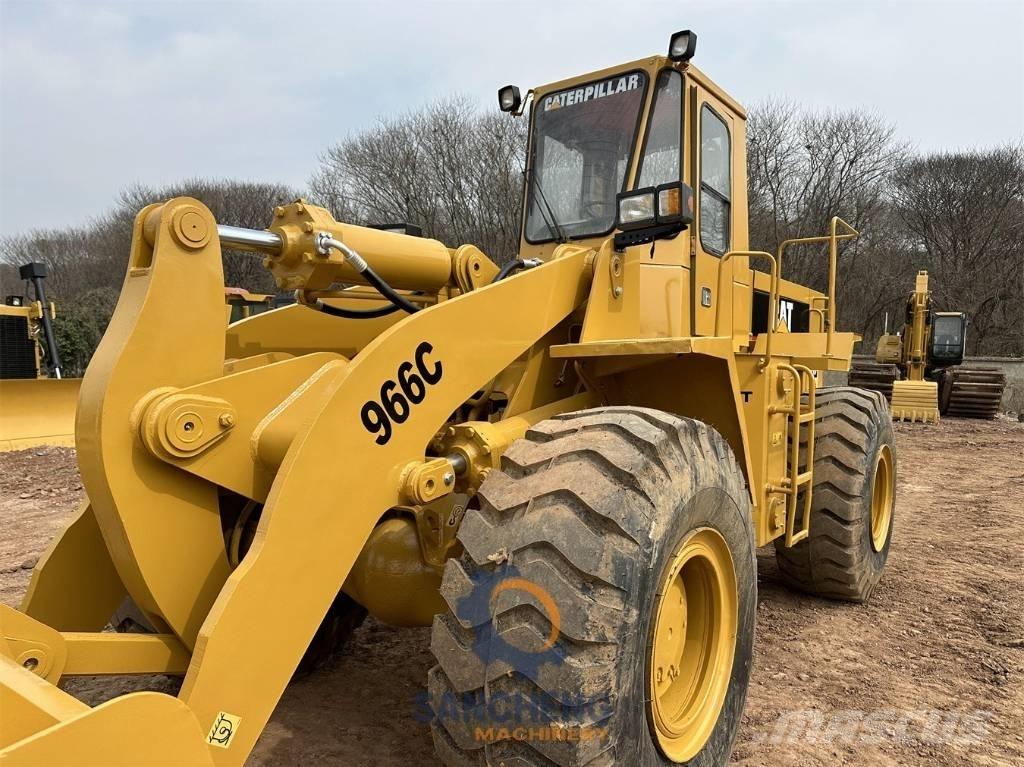 CAT 966C Pale gommate
