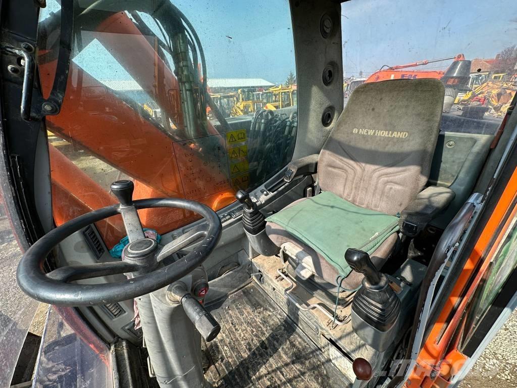 New Holland MH Plus Escavatori gommati