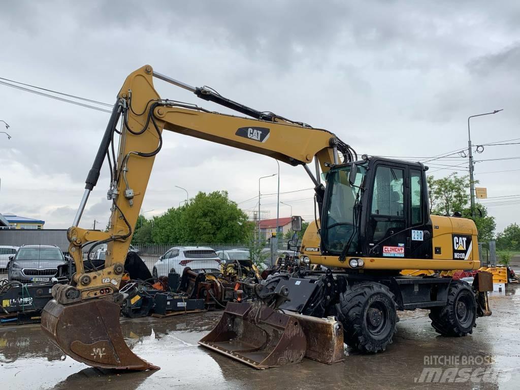 CAT M 313 D Escavatori gommati