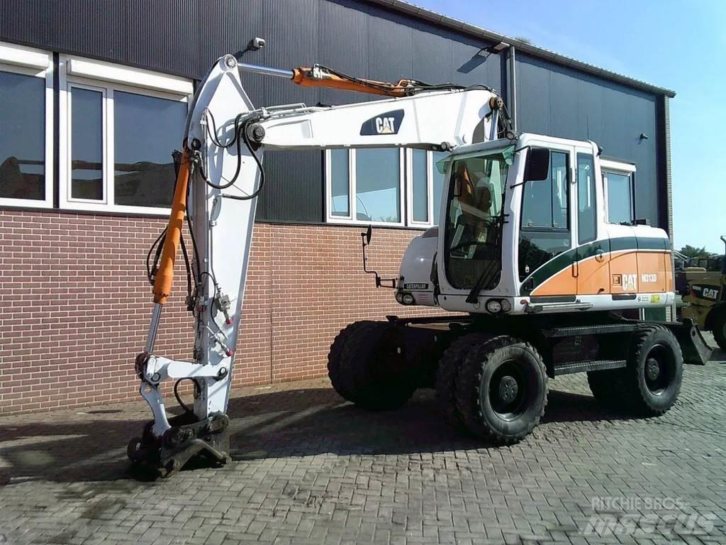 CAT M313D Escavatori gommati