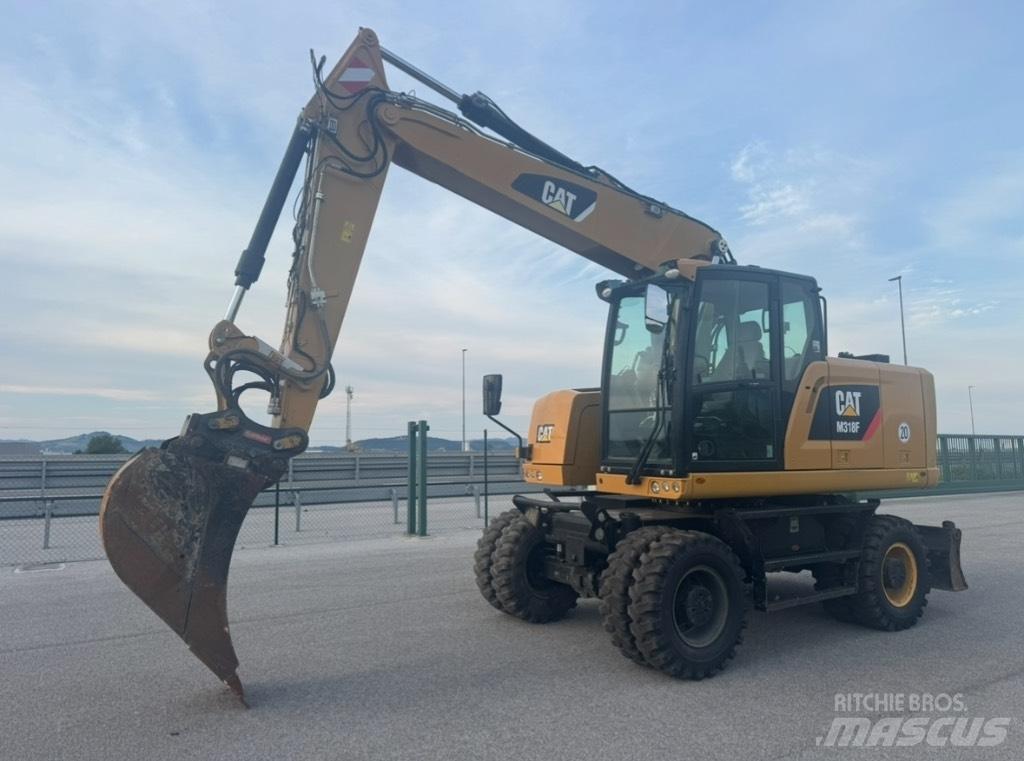CAT M 318 F Escavatori gommati