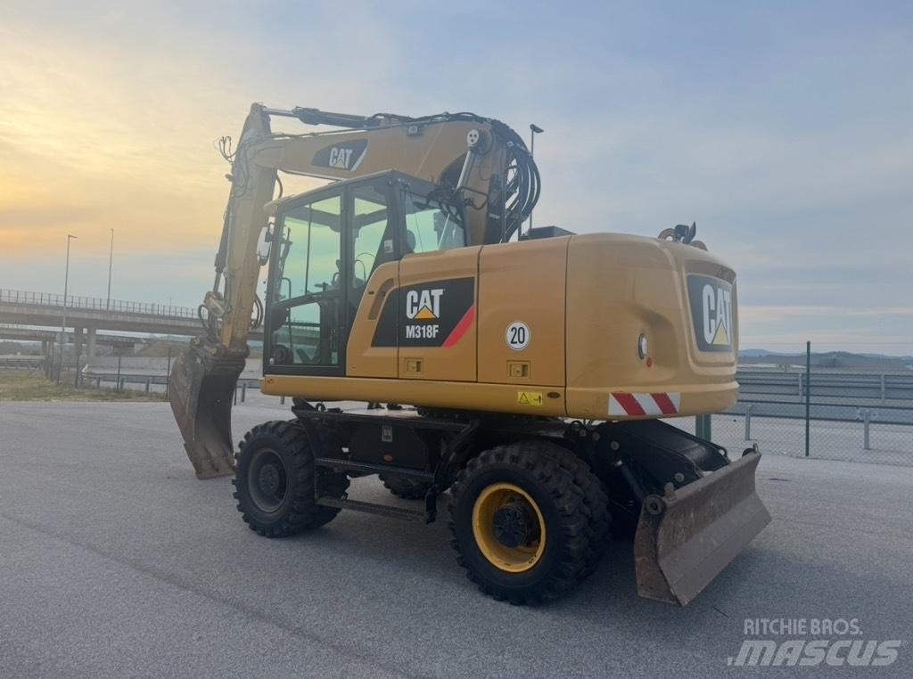 CAT M 318 F Escavatori gommati
