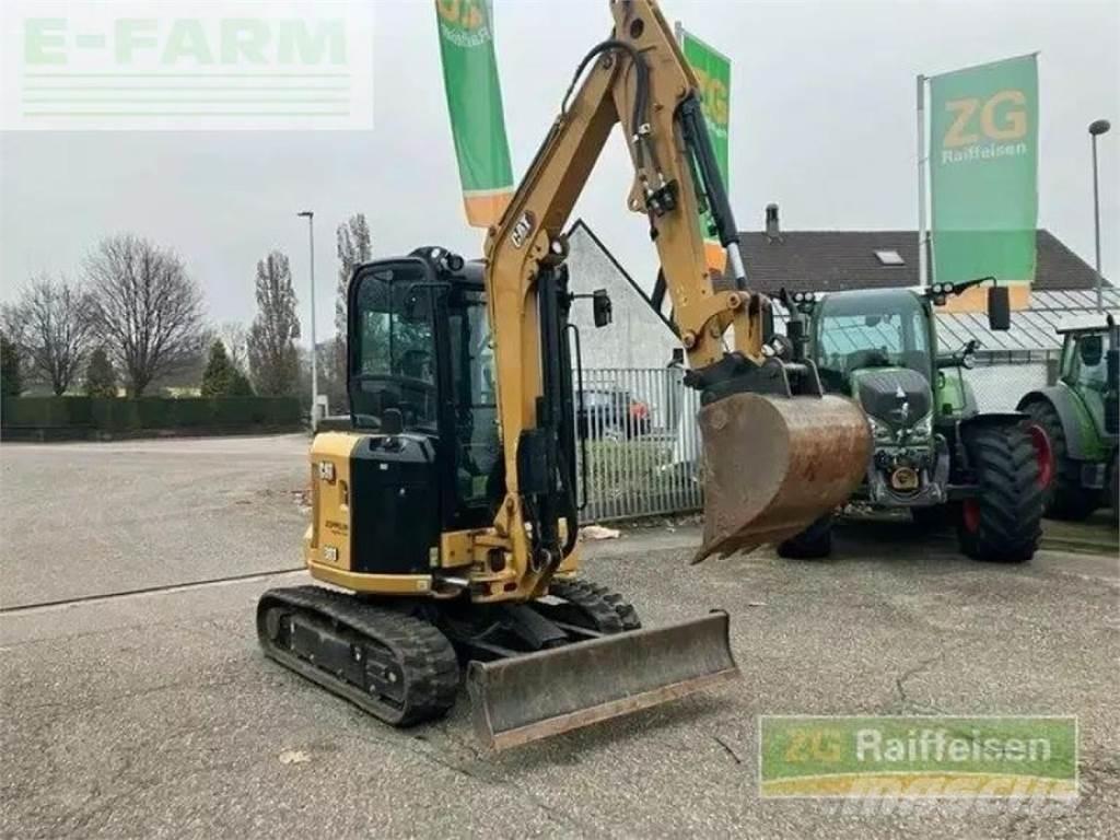 CAT 303 minibagger Escavatori gommati