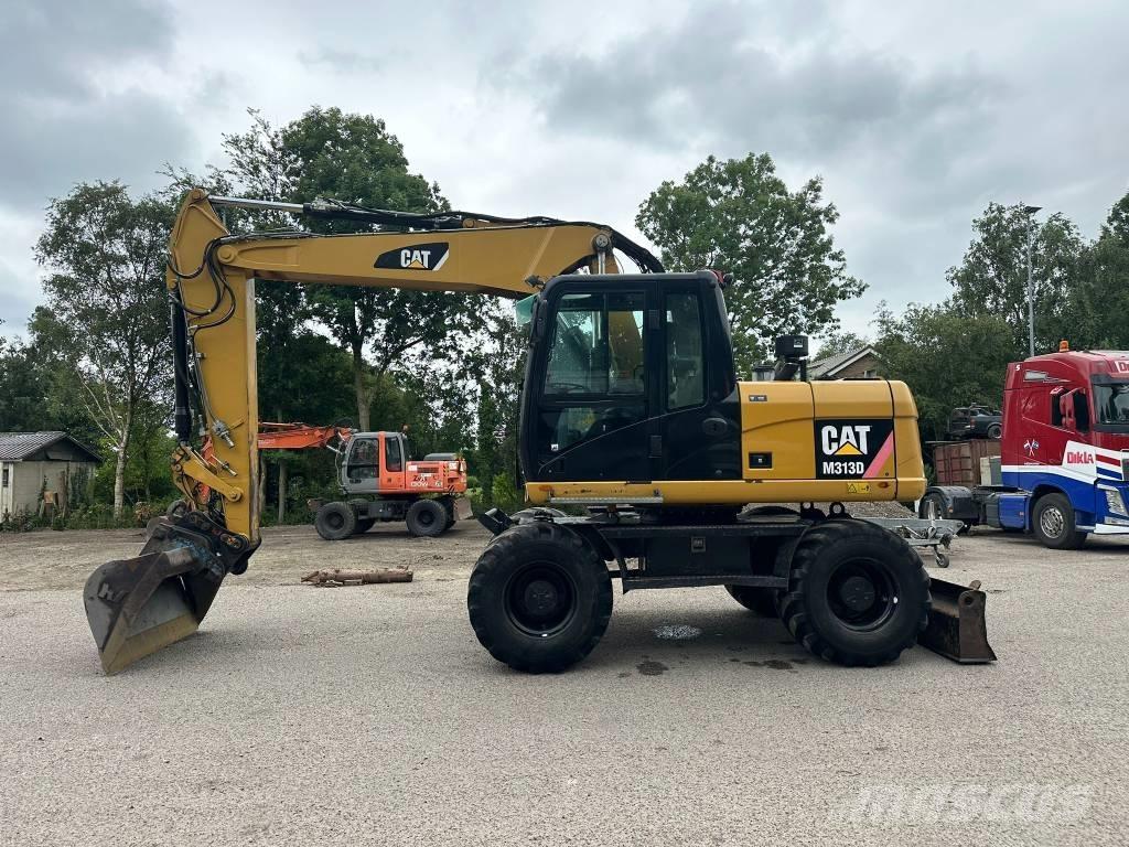 CAT M 313 D Escavatori gommati