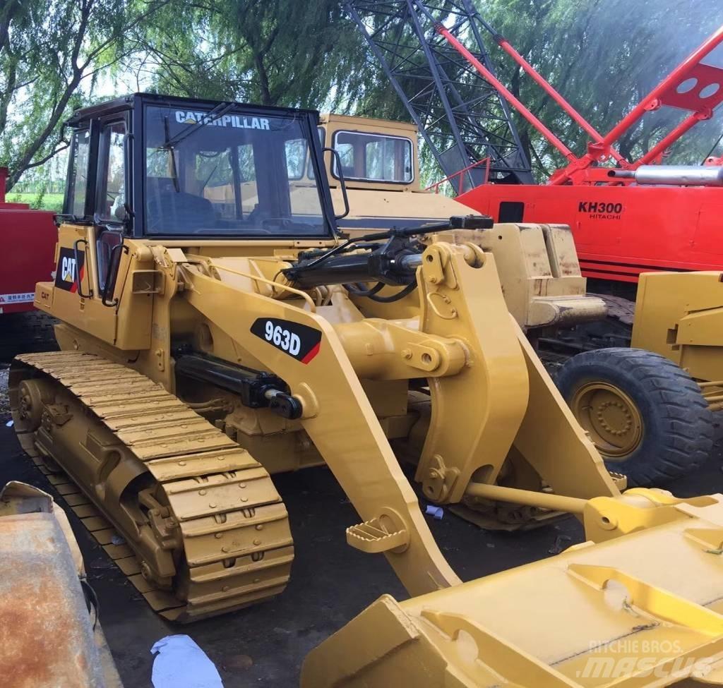 CAT 963 Pale cingolate