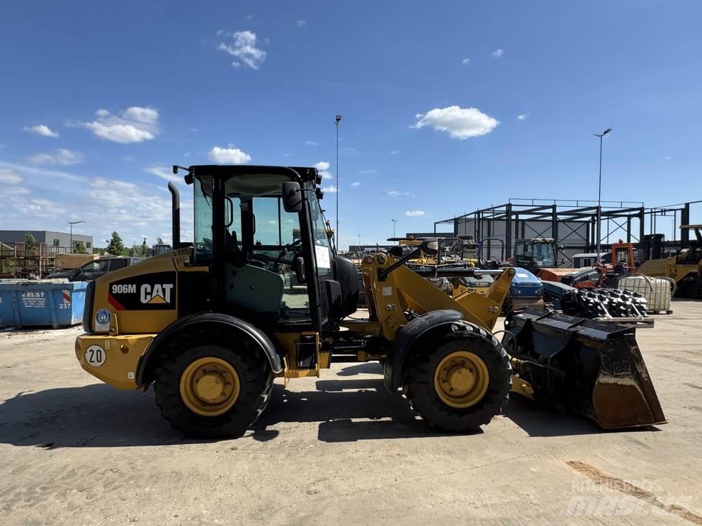 CAT 906M Pale gommate