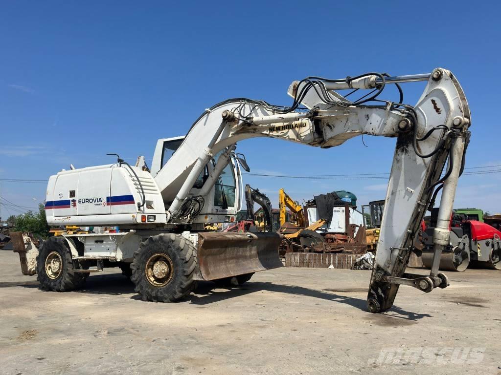 New Holland MH Plus Escavatori gommati