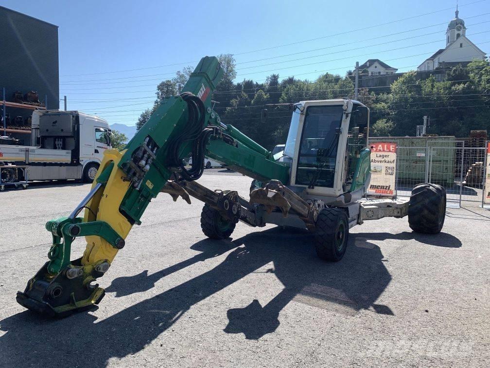 Menzi Muck M325 Escavatori gommati
