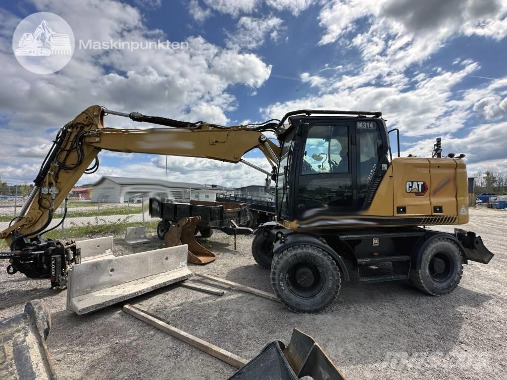 CAT M 314 Escavatori gommati