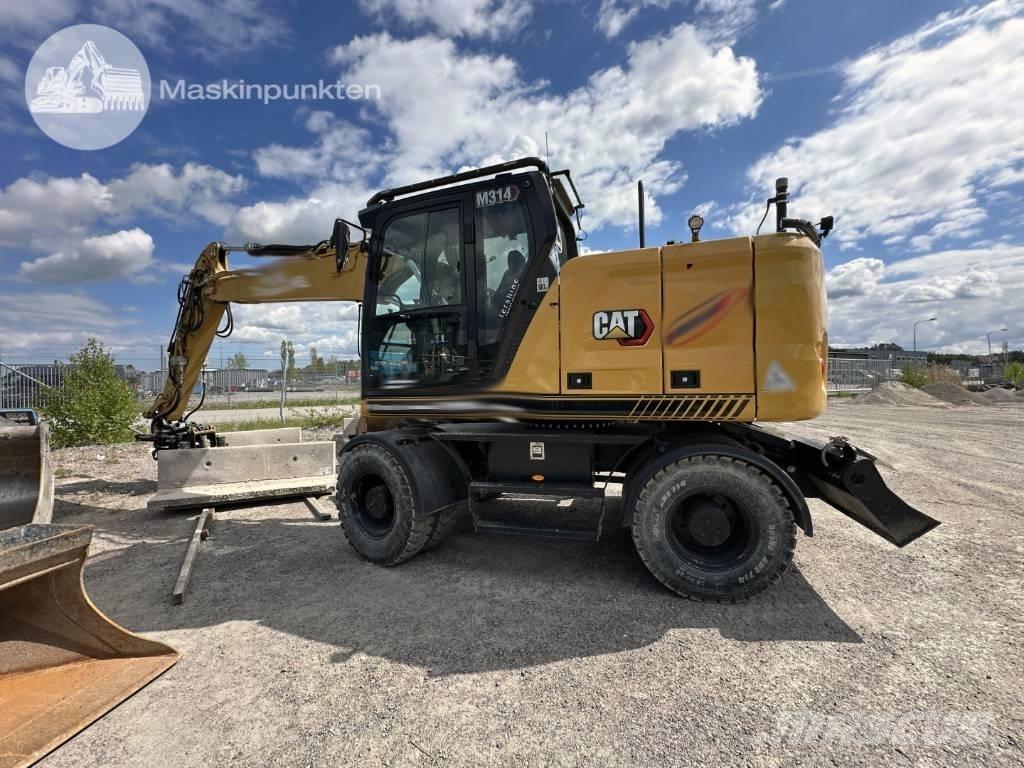 CAT M 314 Escavatori gommati