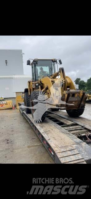 CAT 928G Pale gommate