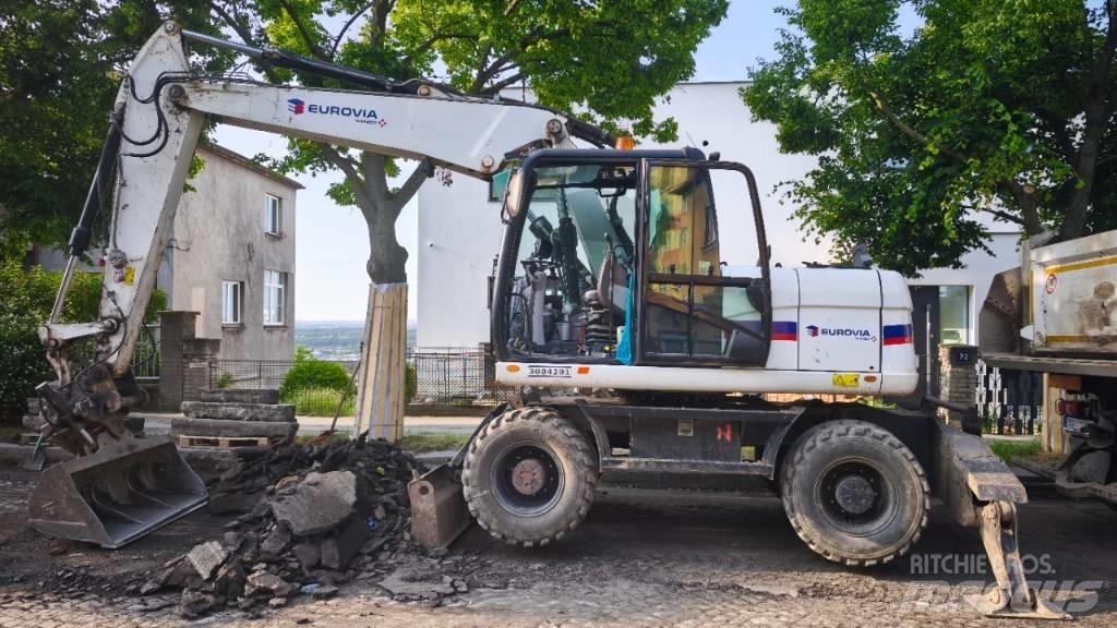 CAT 313 D Escavatori gommati