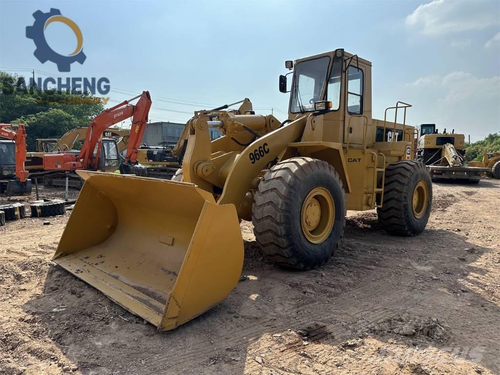 CAT 966C Pale gommate