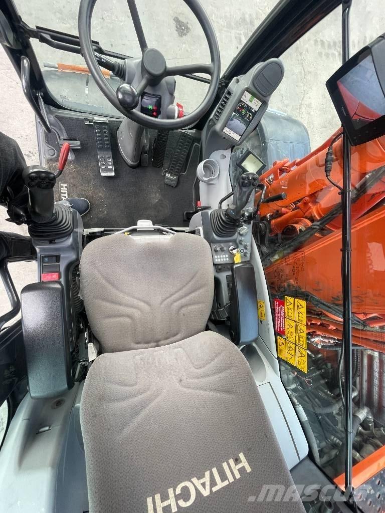 Hitachi 140W Escavatori gommati