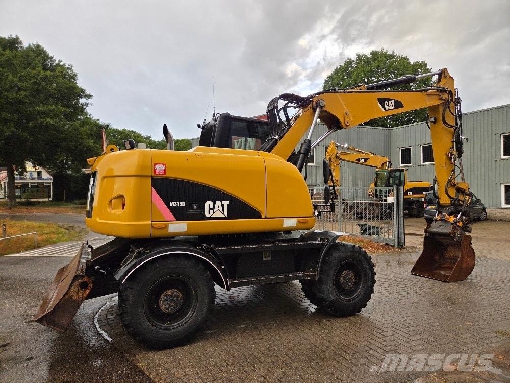 CAT M313D Escavatori gommati