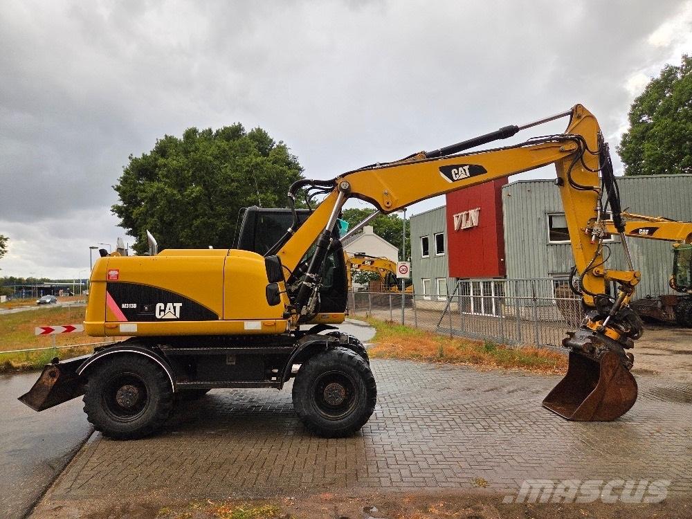 CAT M313D Escavatori gommati