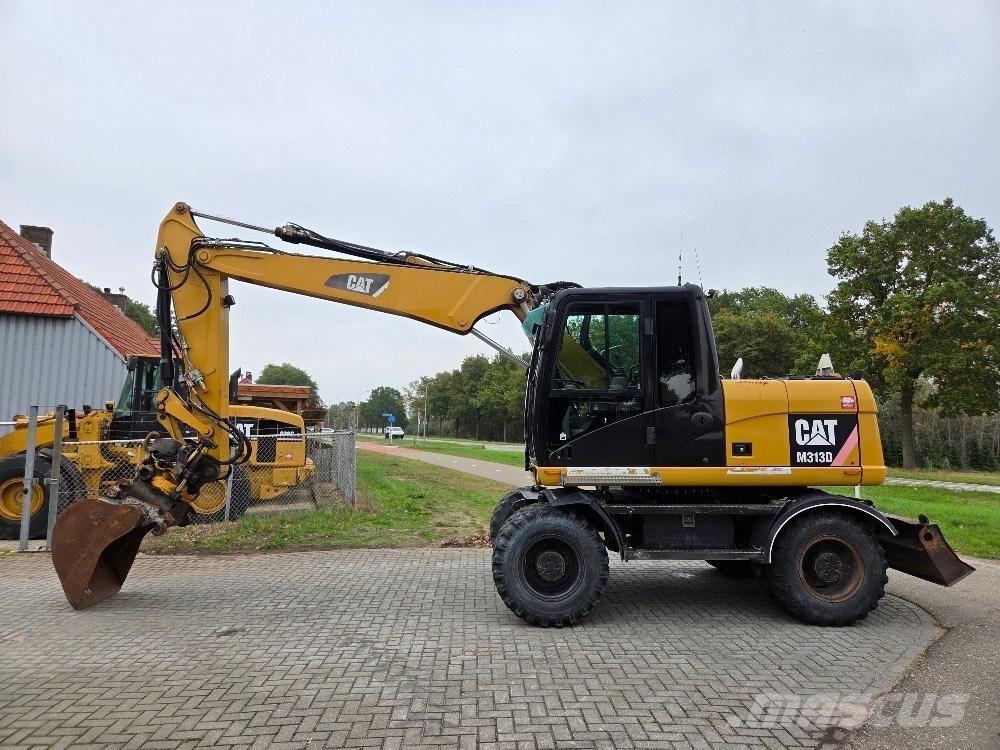 CAT M313D Escavatori gommati