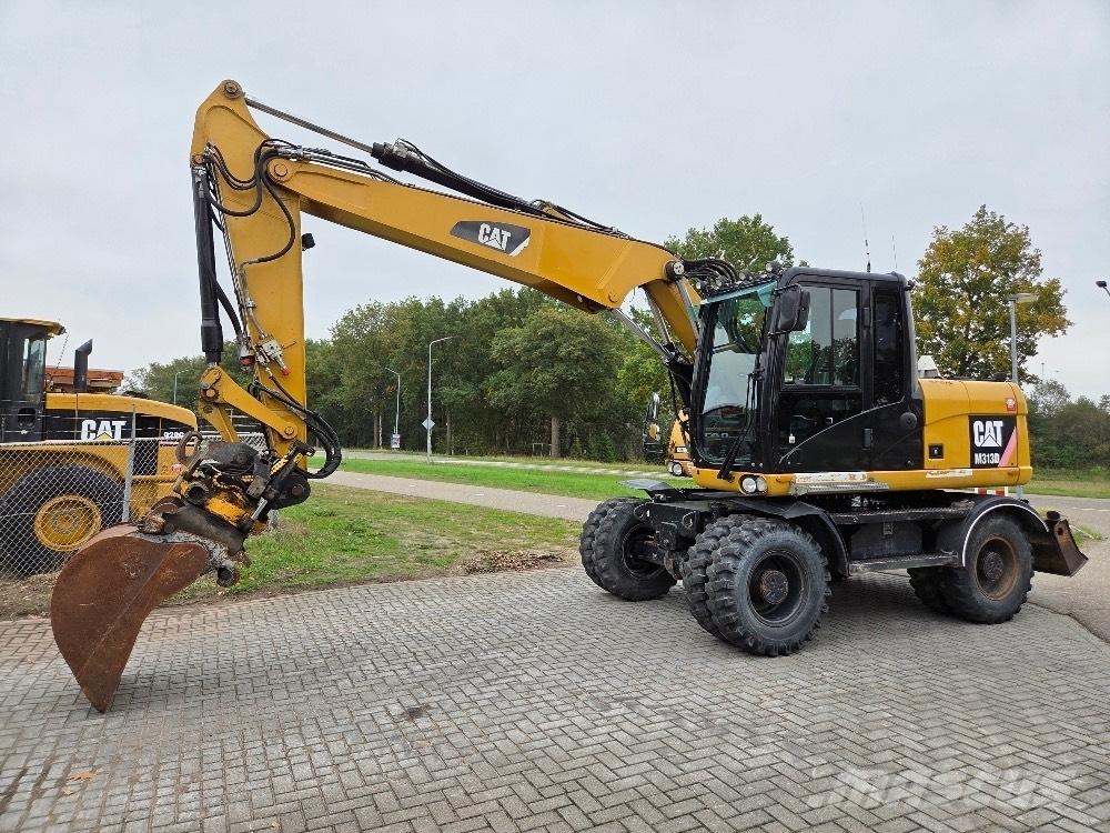 CAT M313D Escavatori gommati