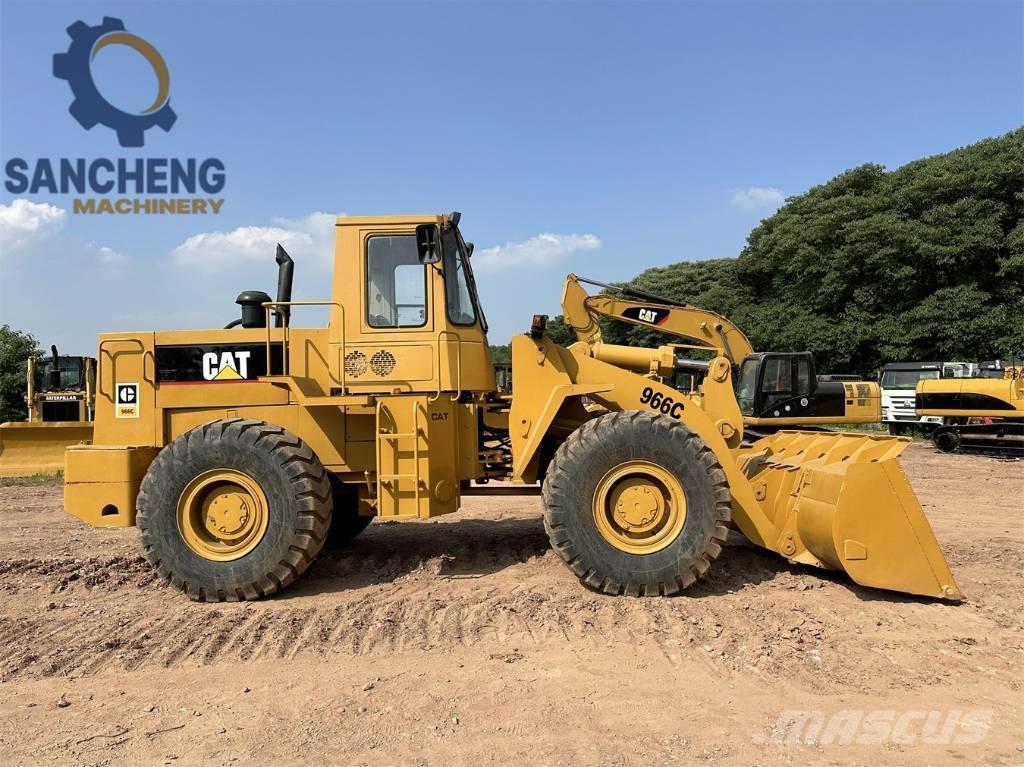CAT 966C Pale gommate