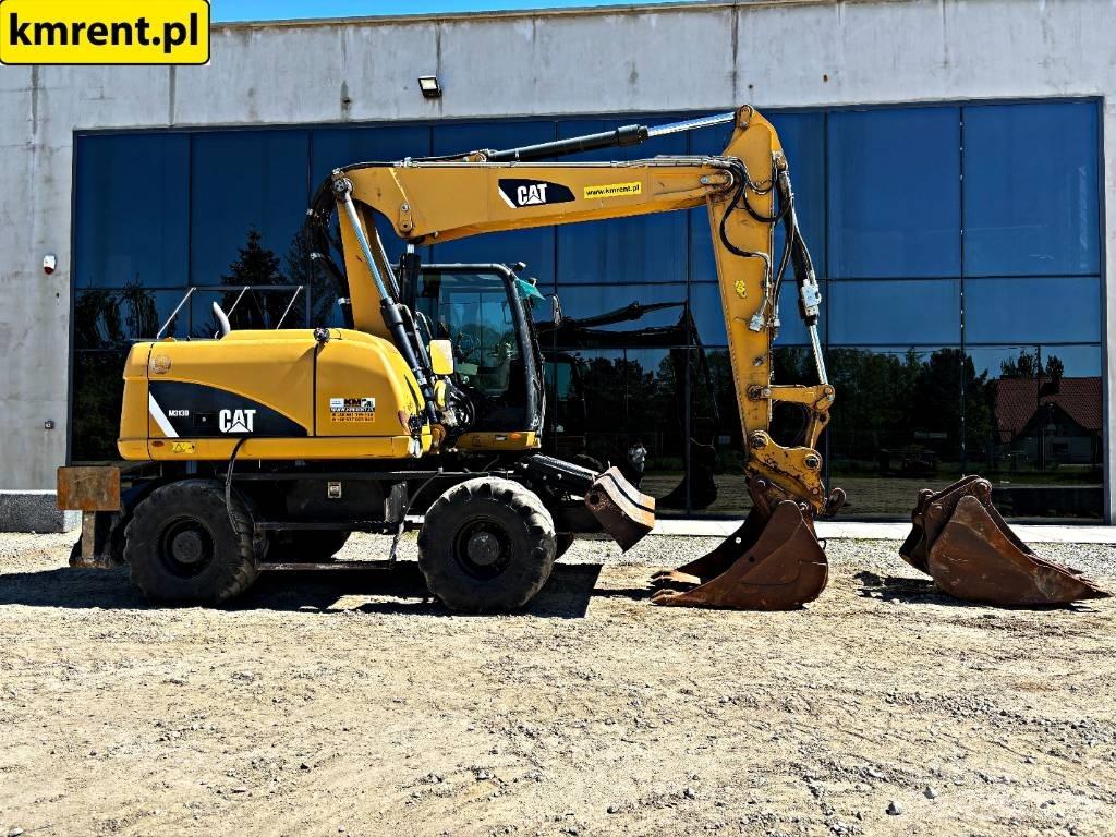 CAT M 313 D Escavatori gommati