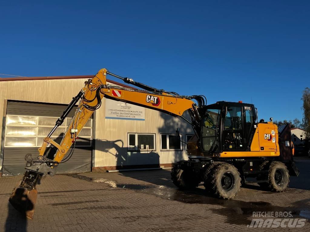 CAT M 315 Escavatori gommati