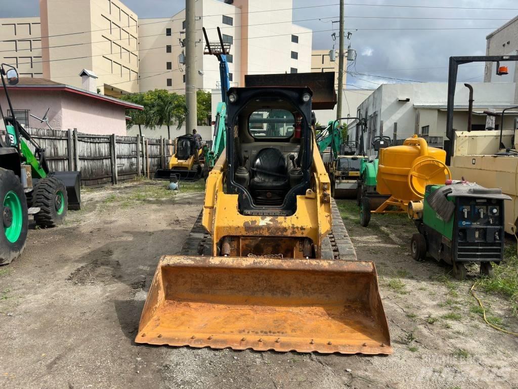 CAT 259 D Mini Pale Gommate