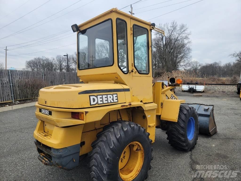 John Deere 244H Pale gommate