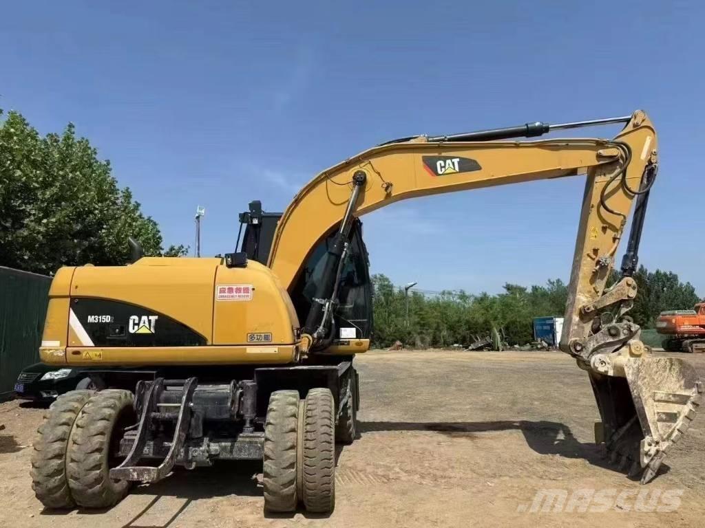 CAT M 315 D Escavatori gommati
